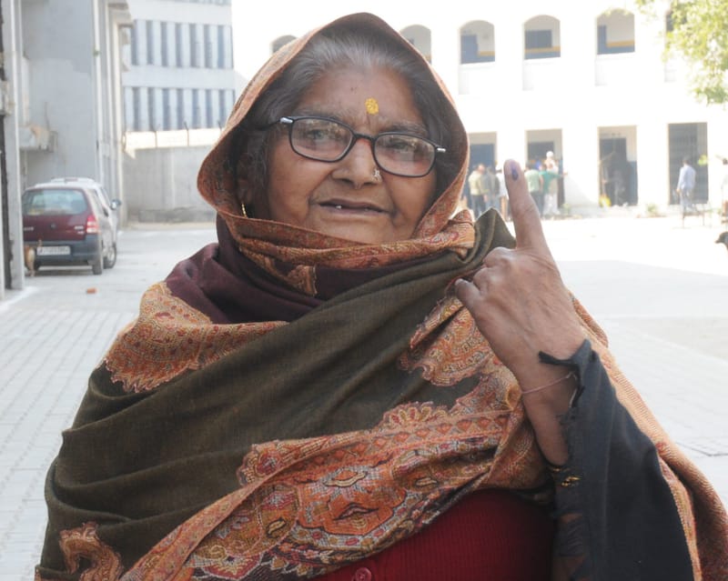 A voter shows her inked finger after voting in Delhi. The electoral roll decides who gets to vote at all. Photo: Election Commission of India / Wikimedia Commons (GODL-India)
